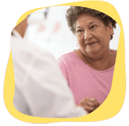 three women on Eastham beach looking into sun